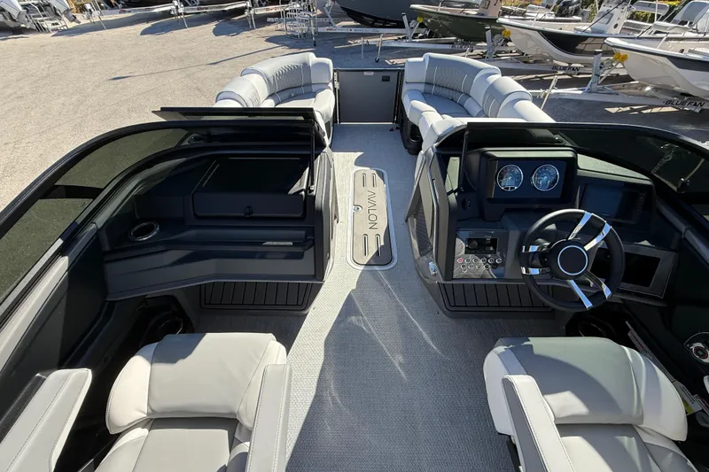 Slide: The Image of 2026 Avalon 2385 Catalina Windshield Quade Lounger, Tri Toon, high-performance interior view. - 27