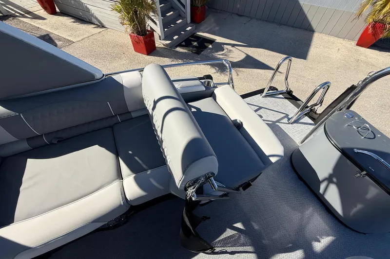 Slide: The Image of Luxurious seating on 2026 Avalon 2385 Catalina Windshield Quade Lounger, Tri Toon boat. - 28