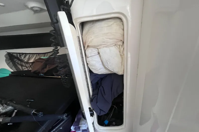 Slide: The Image of Interior of a 2008 Intrepid 370 Cuddy with mounted communication devices. - 43