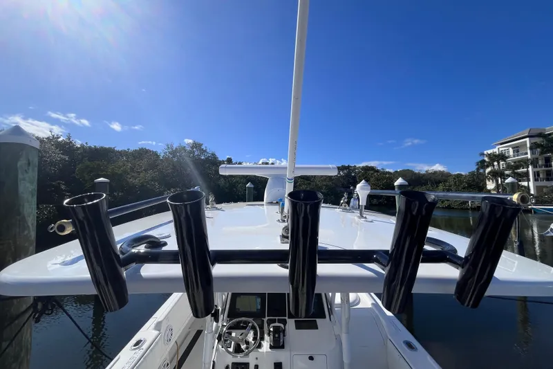 Slide: The Image of Open hatch on 2008 Intrepid 370 Cuddy boat, revealing interior storage space. - 53