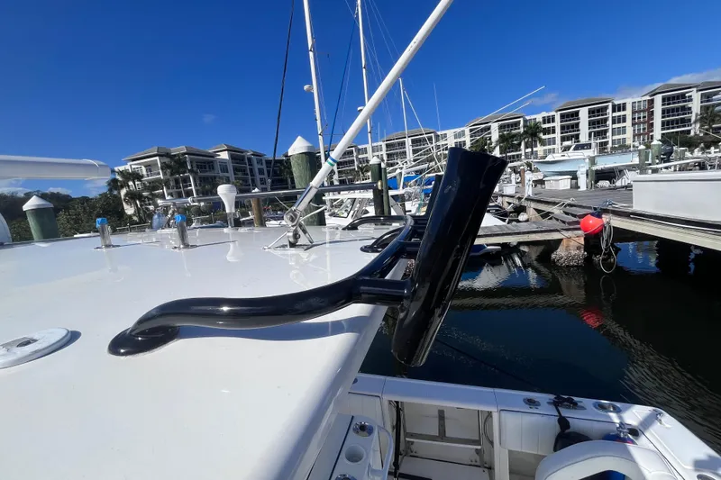 Slide: The Image of 2008 Intrepid 370 Cuddy boat deck at marina, clear blue sky background. - 59