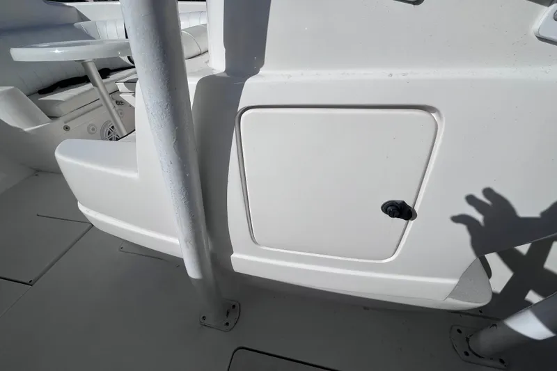 Slide: The Image of 2008 Intrepid 370 Cuddy boat docked at marina with clear blue sky. - 60