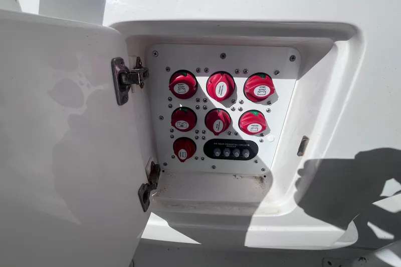 Slide: The Image of 2008 Intrepid 370 Cuddy interior with storage compartment and seating area. - 61