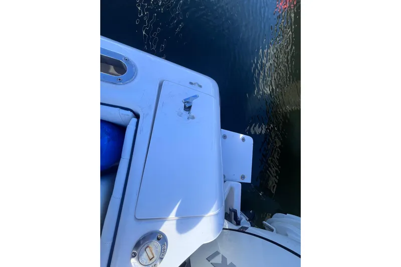 Slide: The Image of Anchor and rope storage in 2008 Intrepid 370 Cuddy boat compartment. - 74