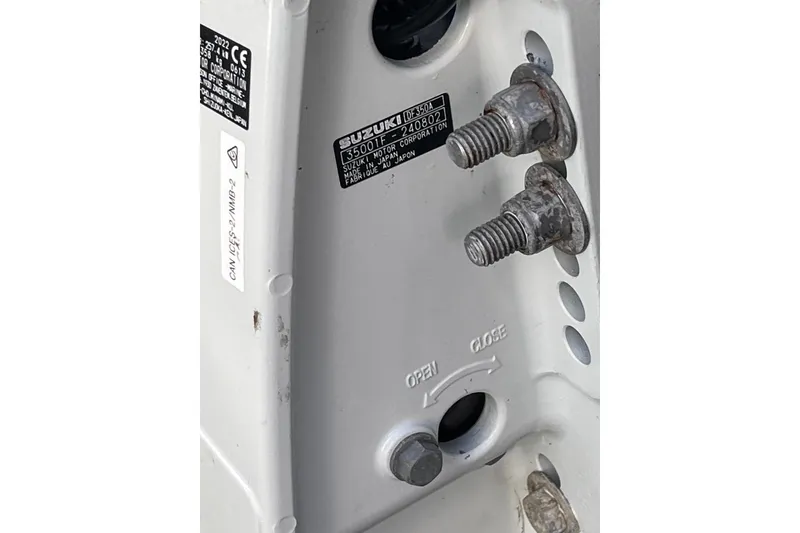 Slide: The Image of Label on Suzuki DF350A engine, serial 35001F-240805, made in Japan, on 2008 Intrepid 370 Cuddy. - 89