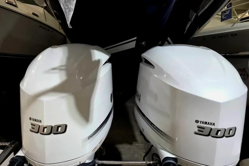 Slide: The Image of Twin Yamaha 300 outboard engines on a 2019 Grady-White Freedom 307 boat. - 19