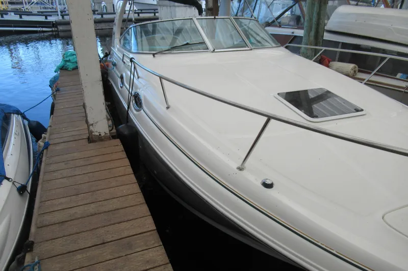 Slide: The Image of 2001 Searay 280 Sundancer docked at marina, side view. - 9