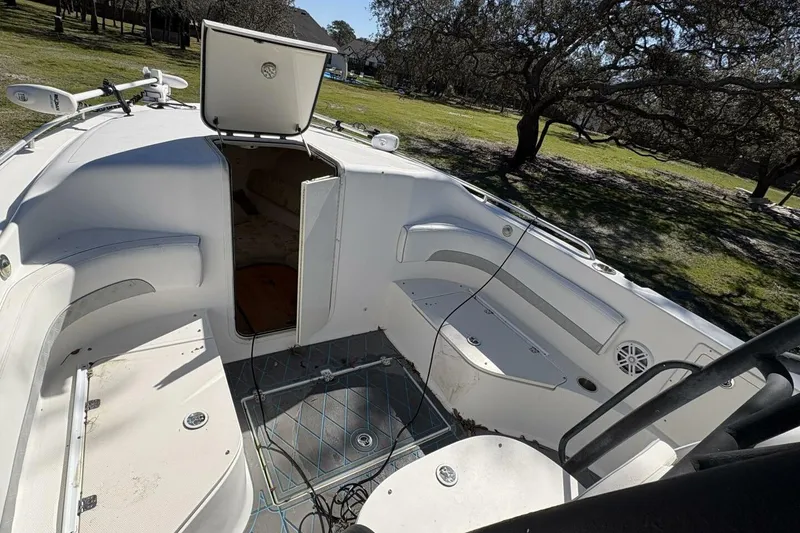 Slide: The Image of 2008 Wellcraft 35 Scarab Sport boat interior with open hatch and seating area. - 6
