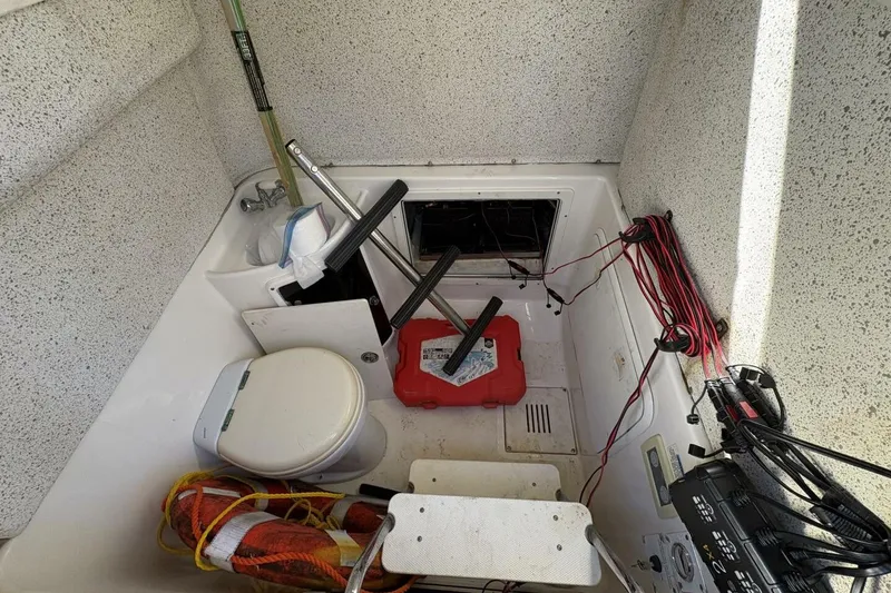 Slide: The Image of 2008 Wellcraft 35 Scarab Sport interior with equipment and wiring. - 68