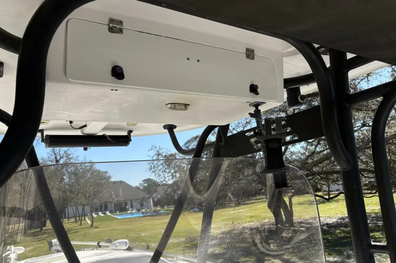 Slide: The Image of 2008 Wellcraft 35 Scarab Sport boat interior with console and equipment. - 96