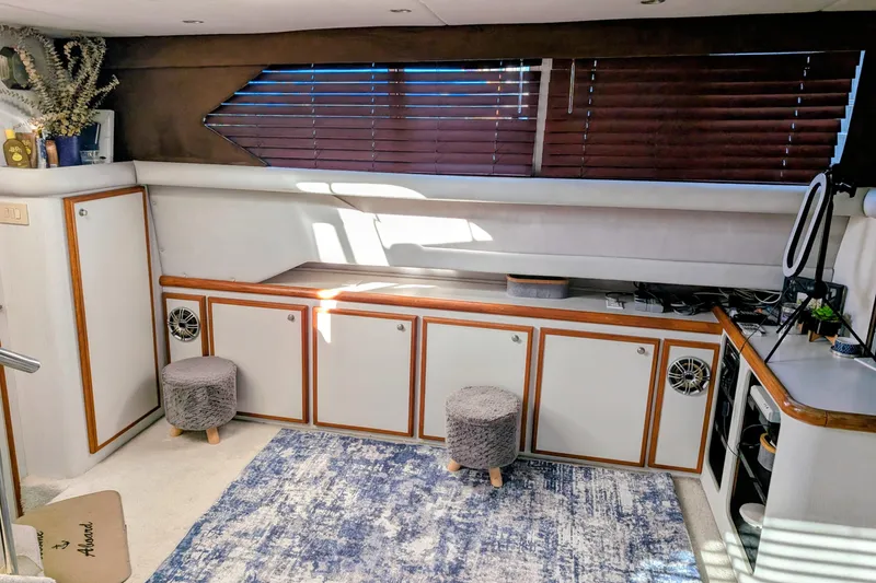 Slide: The Image of 1994 Cruisers Yachts 3850 Aft Cabin interior with modern decor and ample storage. - 17