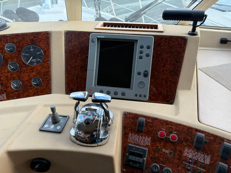 Slide: The Image of Control panel of a 2003 Meridian 490 Pilothouse yacht with navigation equipment. - 25