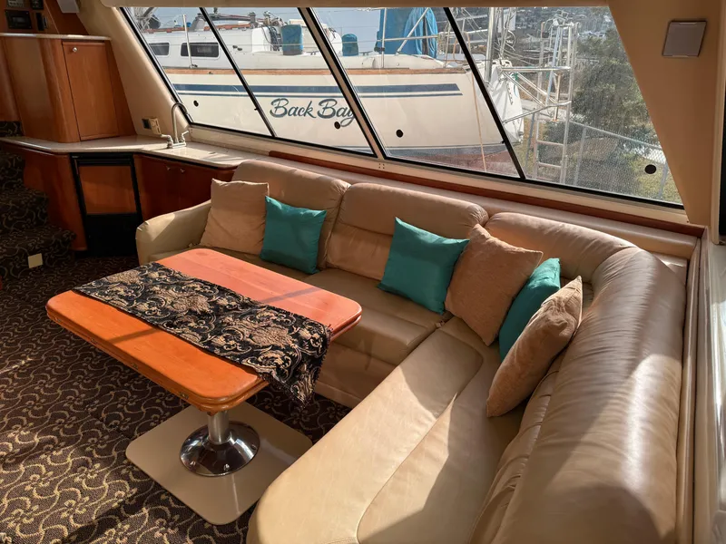 Slide: The Image of Luxurious interior of 2003 Meridian 490 Pilothouse with plush seating and elegant decor. - 3