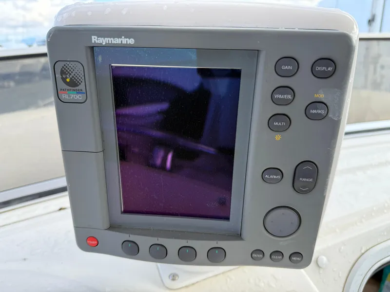 Slide: The Image of Raymarine display on 2003 Meridian 490 Pilothouse boat, showing navigation controls. - 39