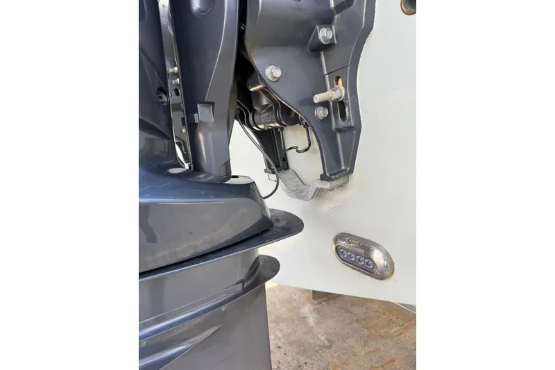 Slide: The Image of Close-up of 2022 Sea Hunt Gamefish 27 motor and transom details. - 25