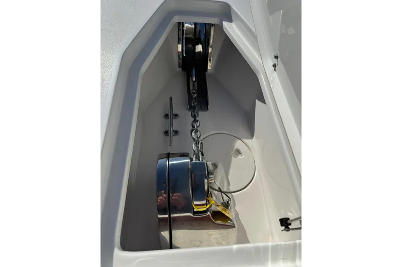 Slide: The Image of Anchor compartment of 2022 Sea Hunt Gamefish 27 Forward Seating boat. - 9