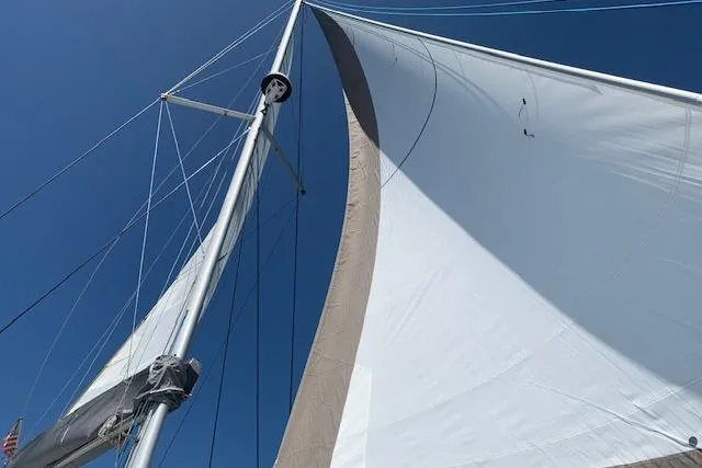 Slide: The Image of Sailing yacht Bali 4.0, 2017 model, with white sails against a clear blue sky. - 5