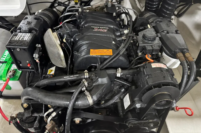 Slide: The Image of Engine of a 2000 Cobalt 246 boat, featuring complex wiring and components. - 13