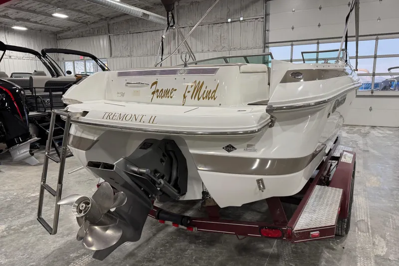 Slide: The Image of 2000 Cobalt 246 boat on trailer in indoor storage facility. - 5