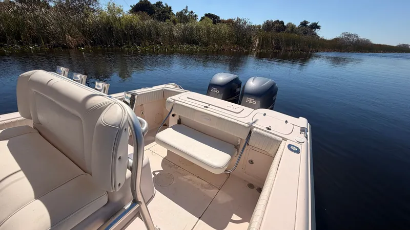 Slide: The Image of 2006 Grady-White Chase 273 boat on calm water with dual engines. - 9