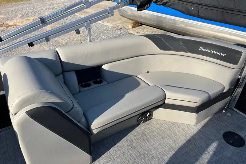 Slide: The Image of Luxurious seating on 2023 Berkshire 24RFX LE pontoon boat with cup holders and sleek design. - 7