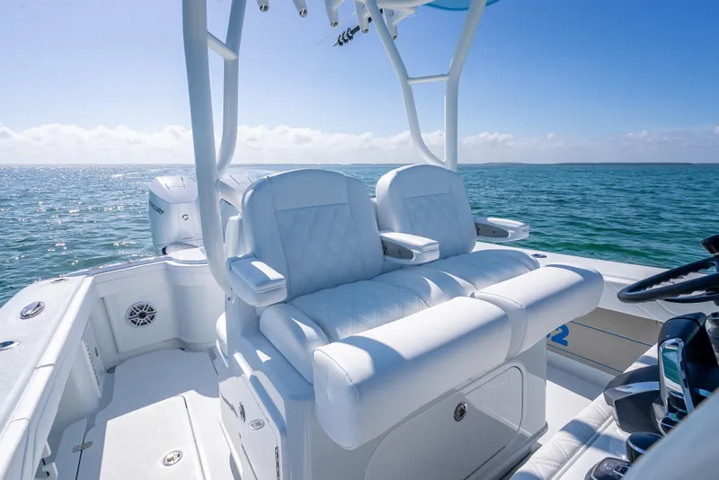 Slide: The Image of 2026 Yellowfin 32 Offshore boat with luxurious seating on open water. - 20