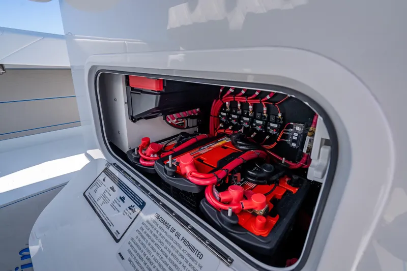 Slide: The Image of Electrical compartment of 2026 Yellowfin 32 Offshore boat, showcasing wiring and components. - 52