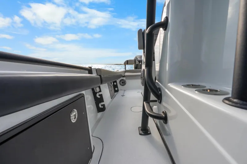 Slide: The Image of 2024 Yellowfin 26 Hybrid boat interior with sleek design and ocean view. - 29