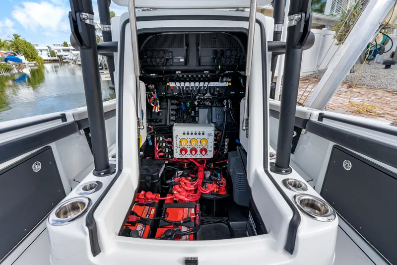 Slide: The Image of 2024 Yellowfin 26 Hybrid boat interior showing electrical system and wiring. - 30