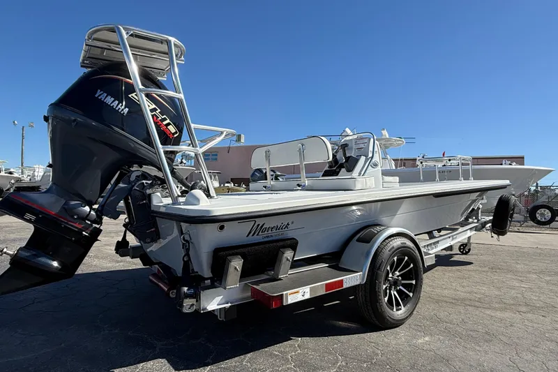 Slide: The Image of 2026 Maverick 17 HPX-S boat with Yamaha engine on trailer, parked outdoors. - 5