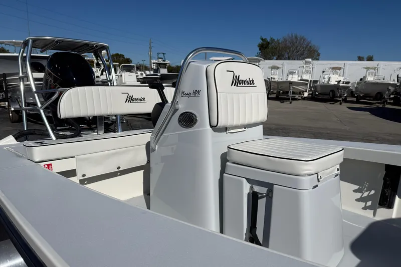 Slide: The Image of 2026 Maverick 17 HPX-S boat interior with white seating and console. - 7