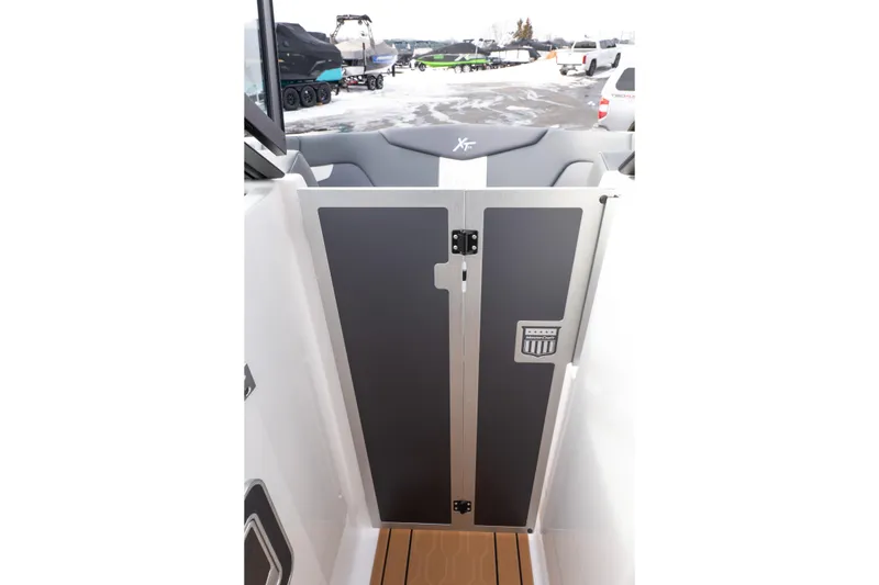 Slide: The Image of 2026 MasterCraft XT24 boat interior with sleek design and modern features. - 18