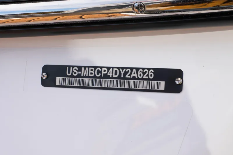 Slide: The Image of 2026 MasterCraft XT24 boat identification plate with serial number and barcode. - 50