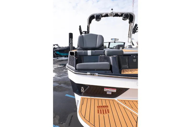 Slide: The Image of 2026 MasterCraft XT24 boat with sleek seating and modern design. - 51