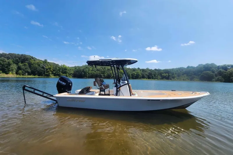 Slide: The Image of 2022 Sea Pro 228 Bay boat on calm water with Suzuki 250 engine. - 3