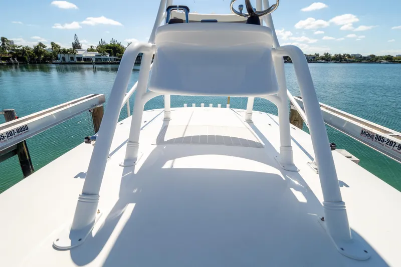 Slide: The Image of 2015 Intrepid 400 Center Console boat on calm water, sunny day, docked. - 107