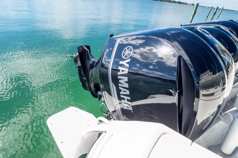 Slide: The Image of 2015 Intrepid 400 Center Console with Yamaha outboard engines on clear water. - 29