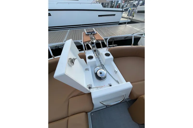 Slide: The Image of 2026 Jeanneau TH33 boat deck with anchor chain and seating area. - 14