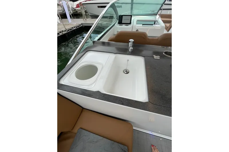 Slide: The Image of 2026 Jeanneau TH33 boat interior with sink and countertop. - 21