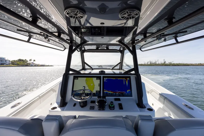 Slide: The Image of 2023 Yellowfin 42 boat cockpit with advanced navigation system. - 39