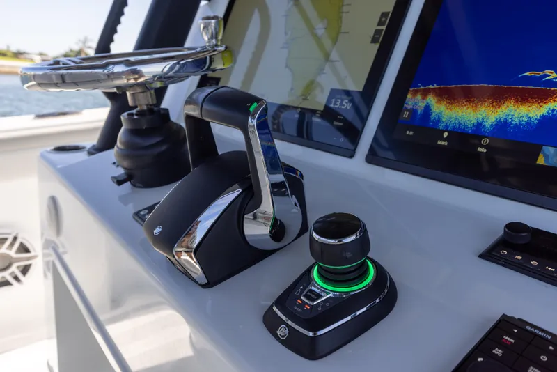 Slide: The Image of Control panel of a 2023 Yellowfin 42 boat with navigation screens. - 46