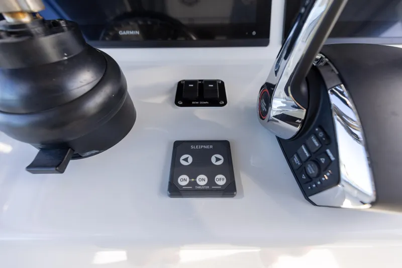 Slide: The Image of Yellowfin 42 boat control panel with Garmin display and Sleipner thruster controls, 2023 model. - 47