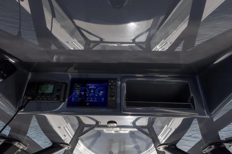 Slide: The Image of Control panel of 2023 Yellowfin 42 boat with navigation and electronic displays. - 49