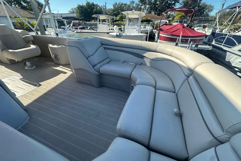 Slide: The Image of 2018 Bennington 24 SSRX pontoon boat with spacious seating and modern design. - 8