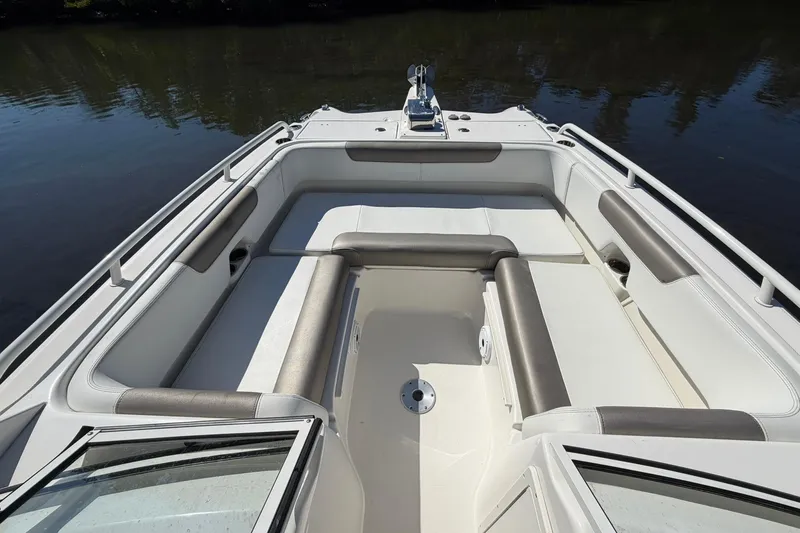 Slide: The Image of 2023 World Cat 255 DC boat interior with spacious seating and sleek design. - 10