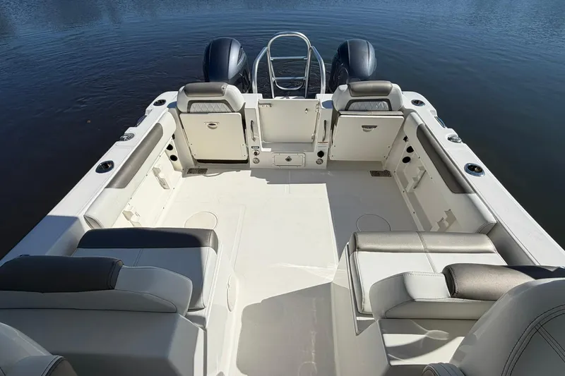 Slide: The Image of 2023 World Cat 255 DC boat interior with spacious seating and dual engines. - 19