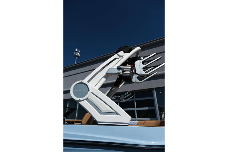 Slide: The Image of 2026 MasterCraft XT24 boat tower against a clear blue sky. - 3