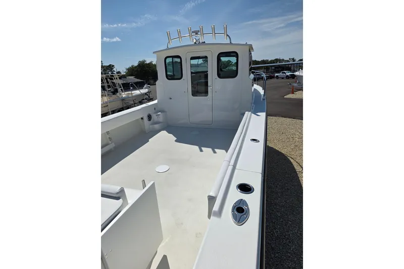 Slide: The Image of 2026 Parker 287 Explorer boat with spacious deck and modern design. - 19
