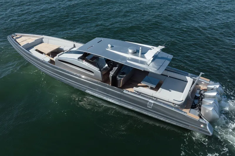 Slide: The Image of 2022 Novamarine BS 160 Outboard boat cruising on open water, sleek design, powerful engines. - 14