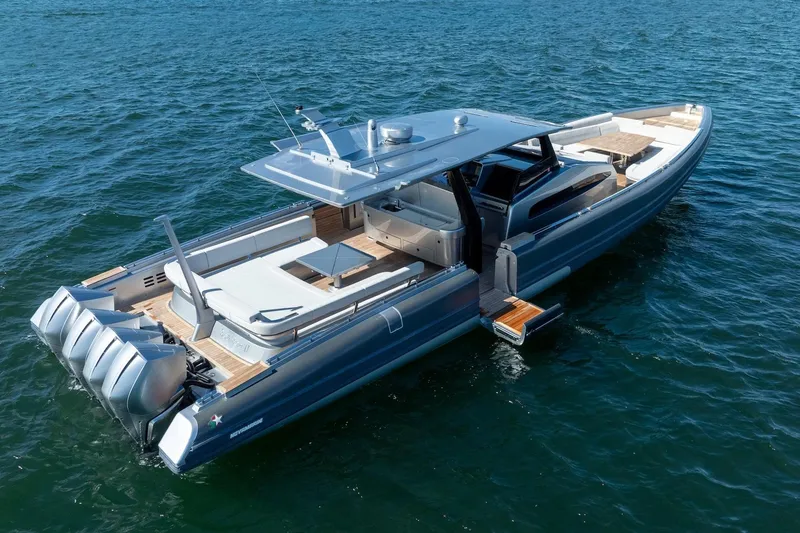 Slide: The Image of 2022 Novamarine BS 160 Outboard boat on open water, showcasing sleek design and powerful engines. - 23